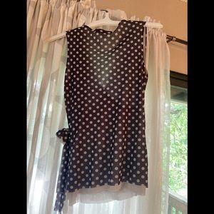 White House Black market top polkadots medium size with bow on the side